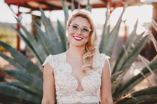 Our real bride and photographer Dana Grant in custom Divine Atelier | Found at Love and Lace Bridal Salon | Featured on Green Wedding Shoes - www.loveandlacebridalsalon.com/blog | cool bride, Wes Anderson inspired, desert wedding, retro wedding