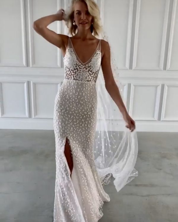Rosey bridal gown from Made With love, available at top California bridal shop, Love and Lace Bridal Salon: image of a woman wearing the Rosey Made With Love wedding gown.