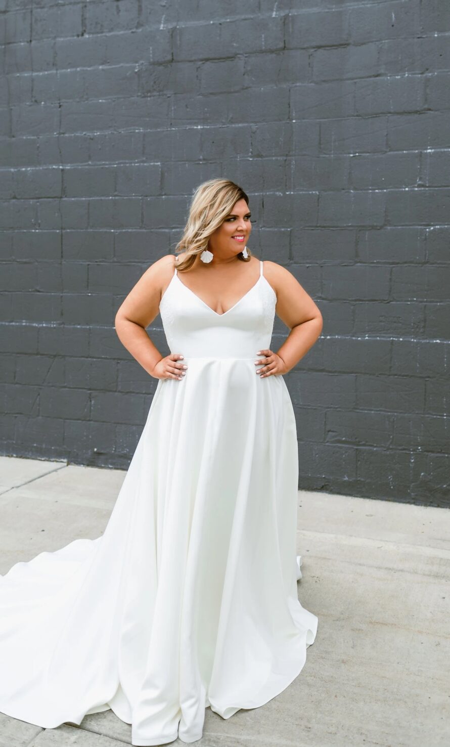 Shop the Victoria plus size gown by Rose and Williams at Love and Lace Bridal Salon in Orange County