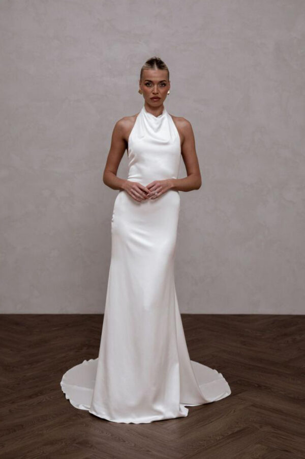 Bride wearing the Harvey bridal gown by Made With Love