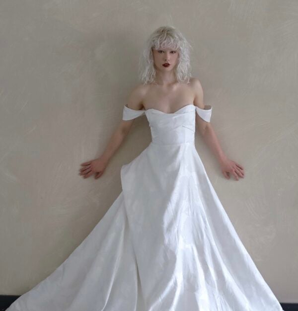 Hannah wedding dress by Tara LaTour Bridal featuring a whimsical floral lace design, romantic sweetheart neckline, and modern A-line silhouette available at Love and Lace Bridal Salon in Orange, CA.
