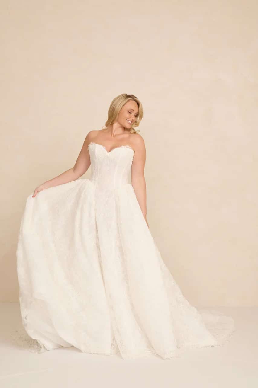 Rue plus size wedding dress by MWL Bride (Made With Love Bridal) in Chantilly lace available at Love and Lace Bridal Salon in Orange, CA.