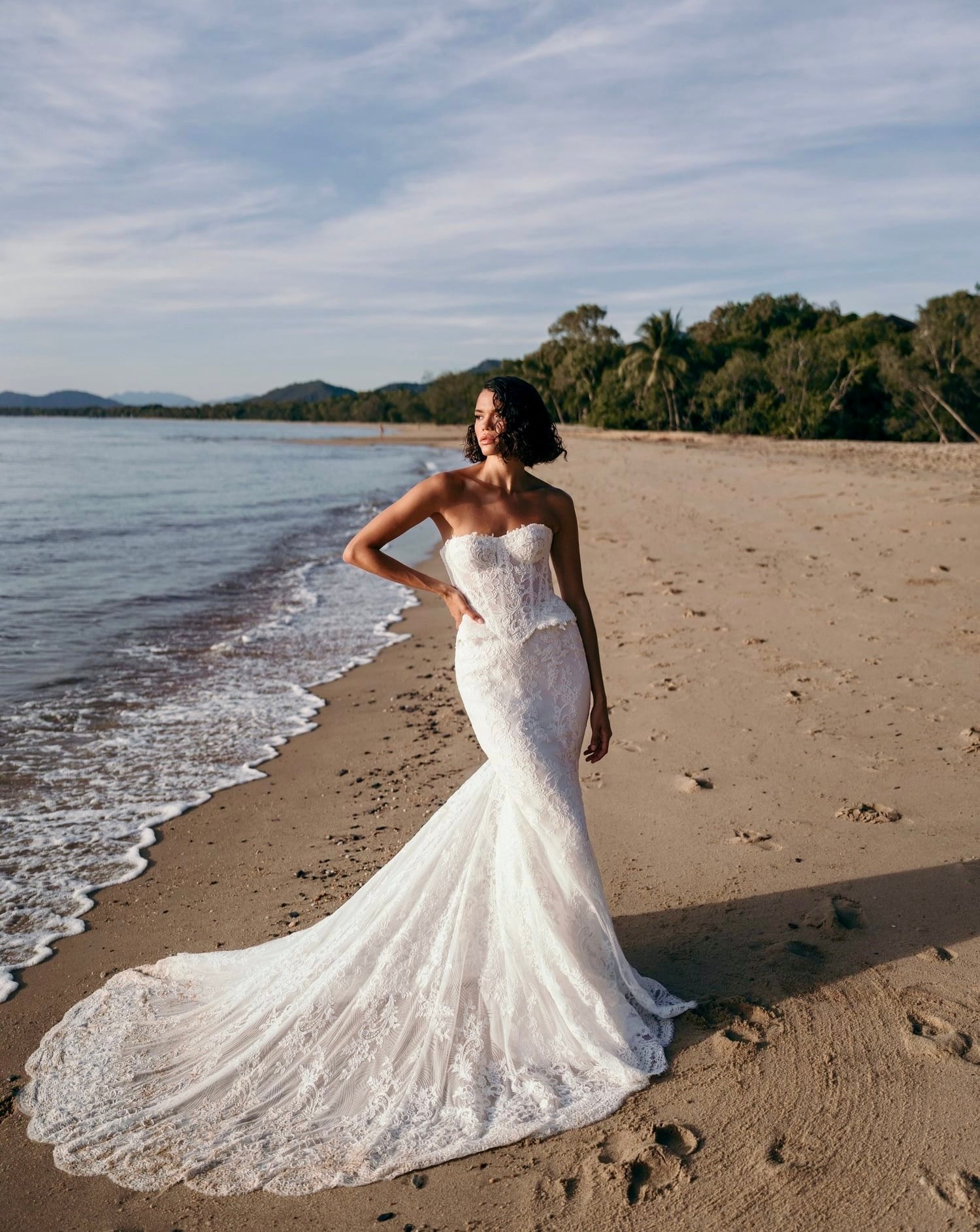 Alena Leena Begonia Chantilly lace wedding dress with a long train available at Love and Lace Bridal Salon in Orange, CA
